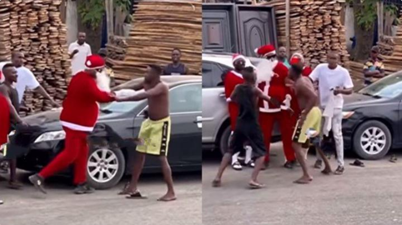 Residents intervene as Father Christmas fights agbero on the street (Video)