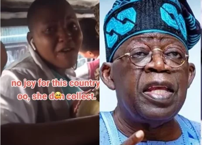 Moment lady got beaten inside public bus for saying Tinubu will win in the incoming election (Video)